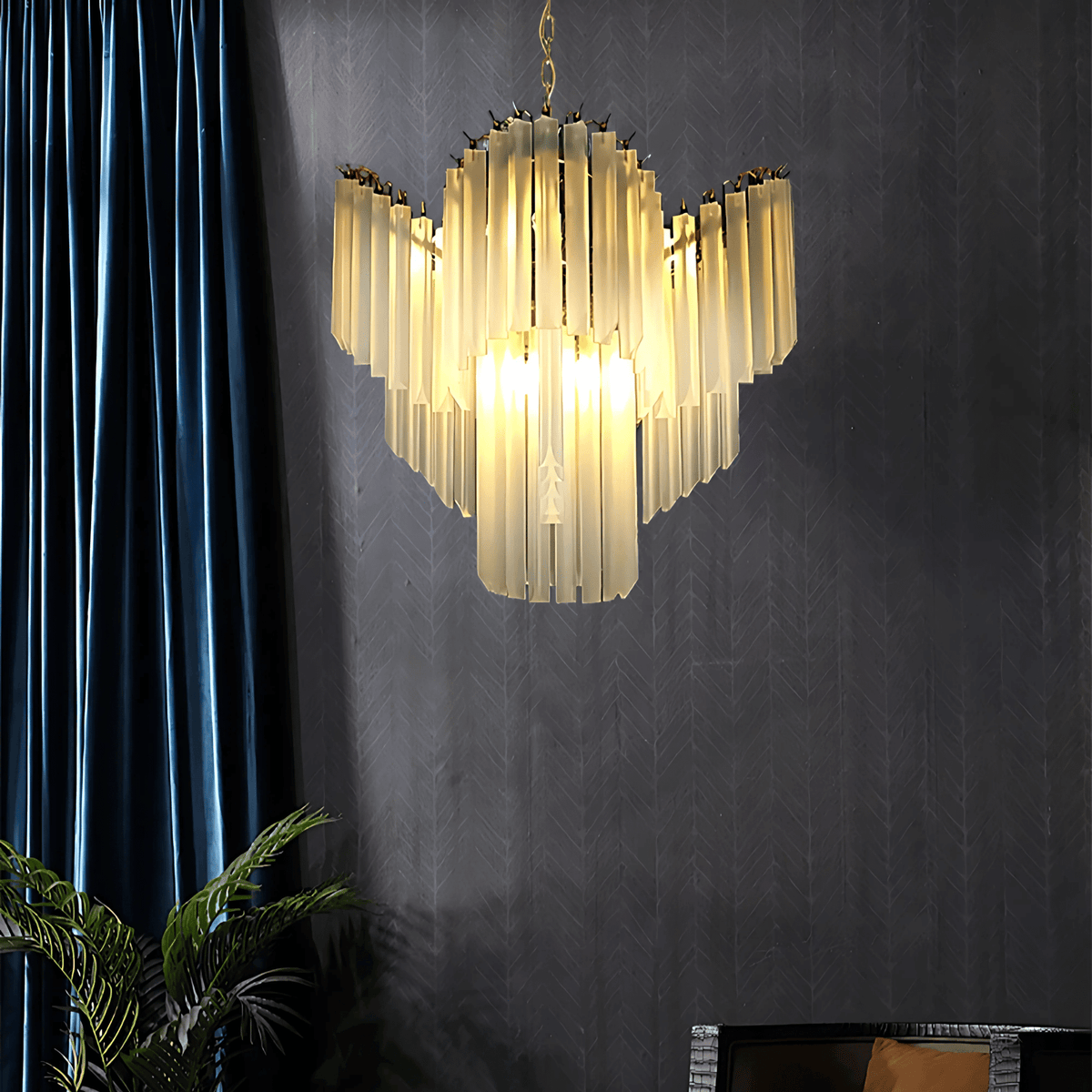 Helsinki glass prism chandelier hanging in a modern living room with dark walls and blue curtains