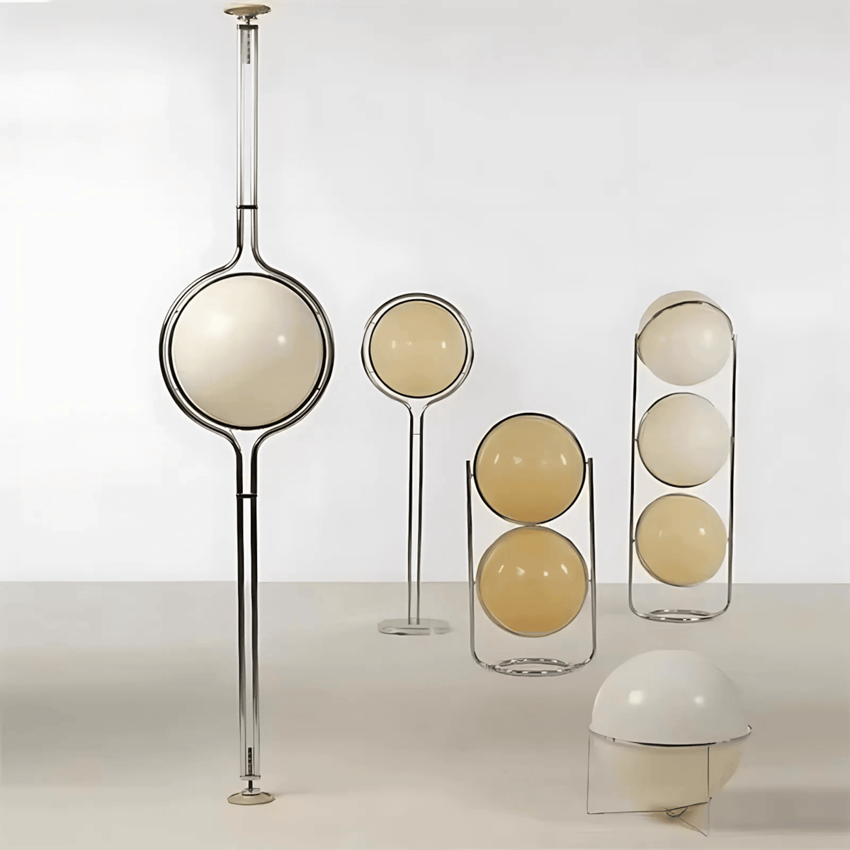 Cardiff floor lamp collection with modern metal frames and acrylic globe shades in multiple indoor lighting styles