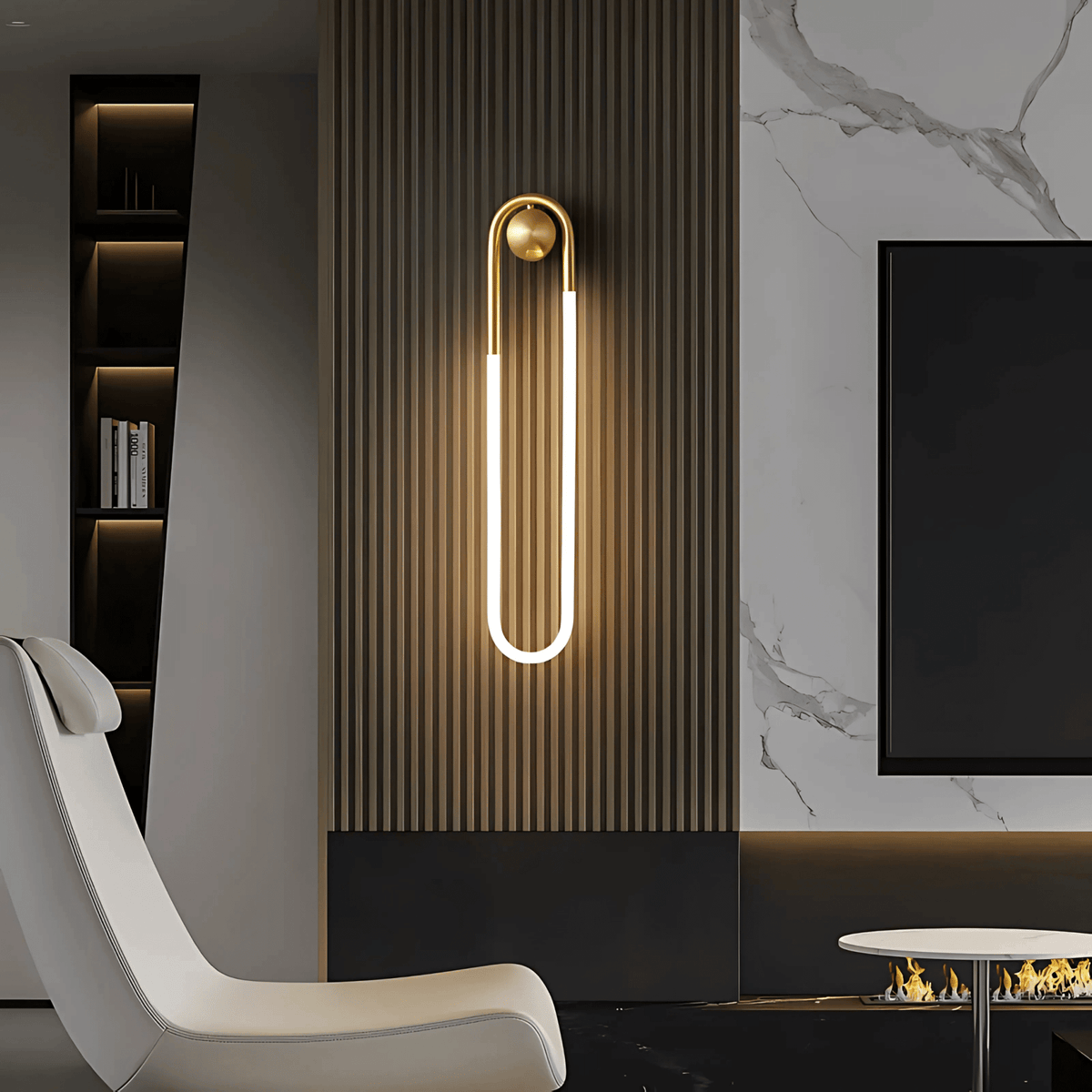 Lisbonne modern wall light with gold frame and warm LED glow on a ribbed interior wall