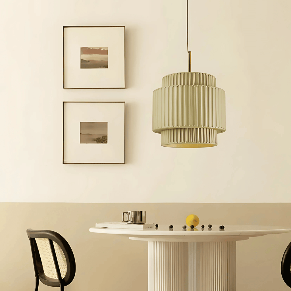 Bangkok pendant light with ribbed resin shade above a modern dining table in a neutral interior
