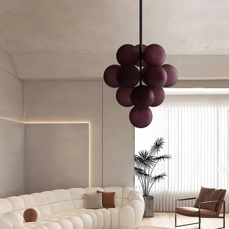 Athens chandelier with clustered purple glass globes in a modern living room