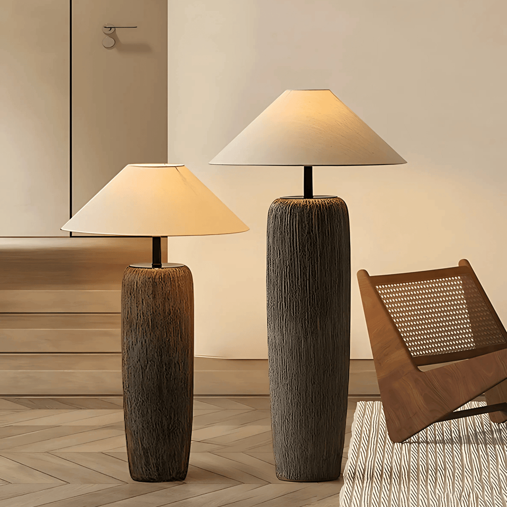 Tokyo floor lamp with textured clay base and wide fabric shade in a modern living room