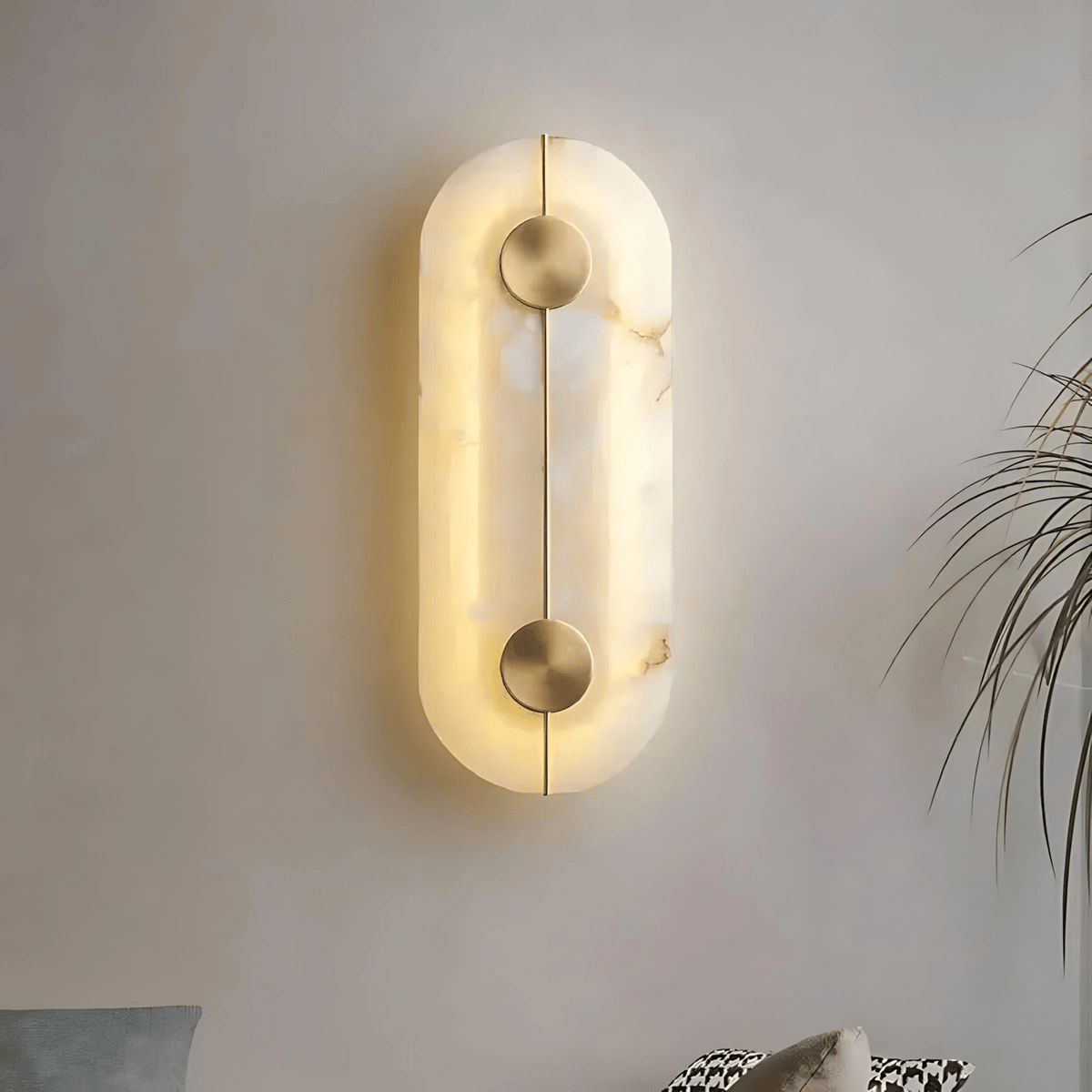 Oslo wall light in metal and natural stone with integrated LED glow mounted on a modern interior wall