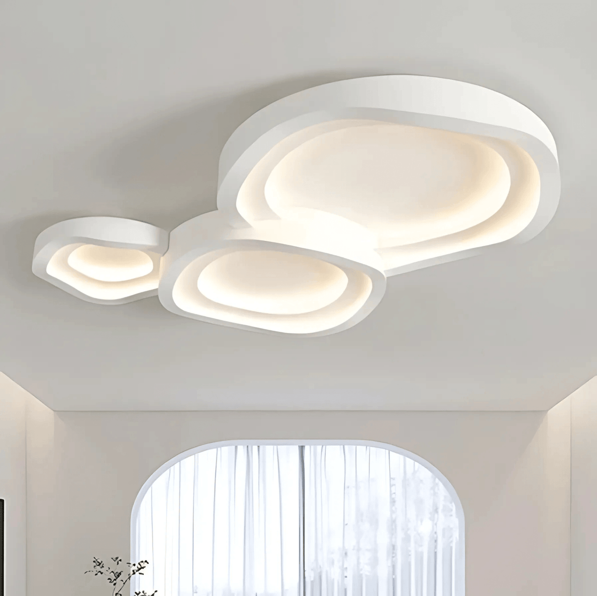 Stockholm modern LED ceiling light with layered white aluminium design in a minimalist living space