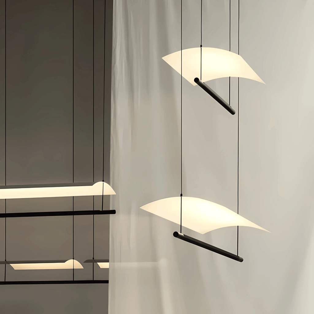 Brasília linear pendant light with curved white LED shade and black metal frame in a modern interior
