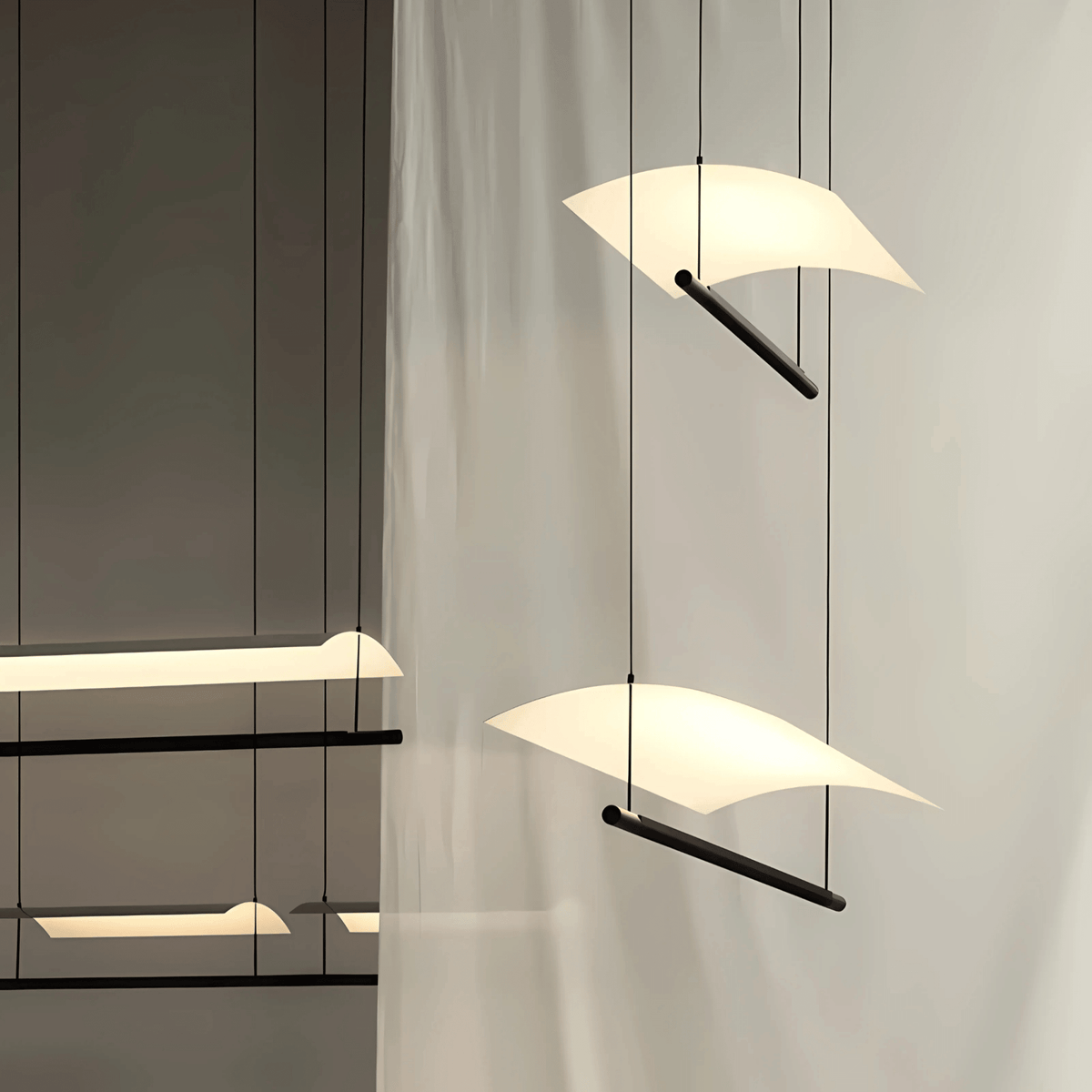 Brasília linear pendant light with curved white LED shade and black metal frame in a modern interior